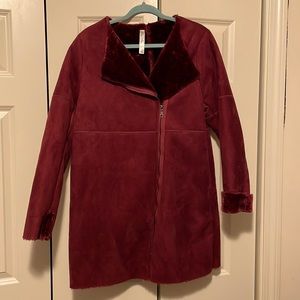 Womens size medium coat in deep red.